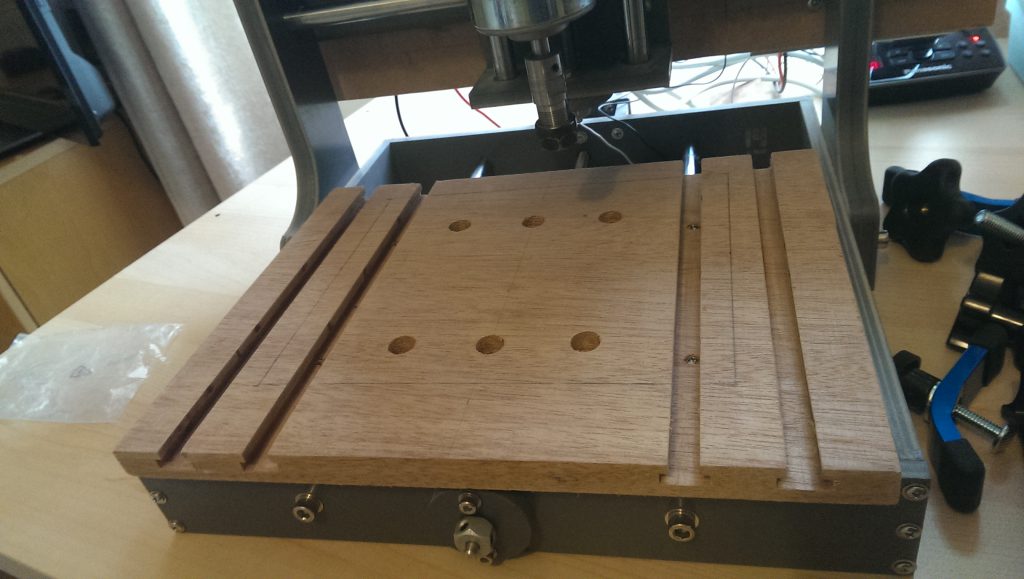 Table screwed to the CNC machine.